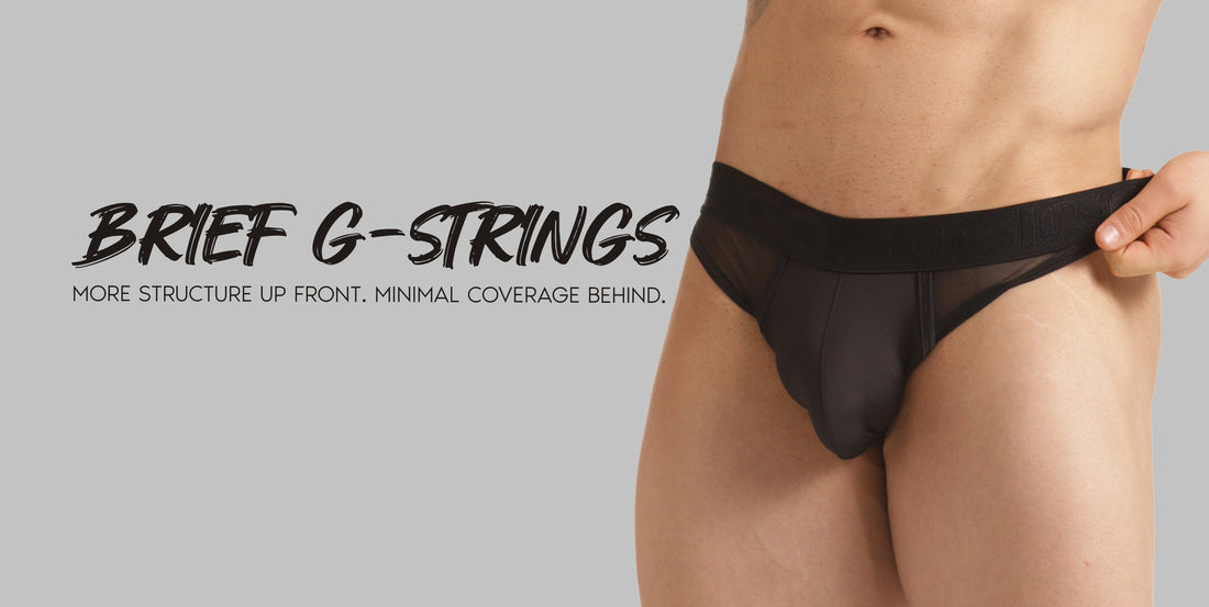 Model wearing Gigo Clandestine Brief G String with a defined black front and a broad waistband.